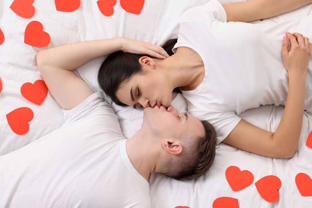 A close-up image depicting couples making physical intimacy, conveying the concept of physical intimacy as a profound expression of love and connection.